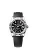 The Oyster Perpetual Sky-Dweller in 18 kt white gold with a bright black dial and an Oysterflex bracelet.